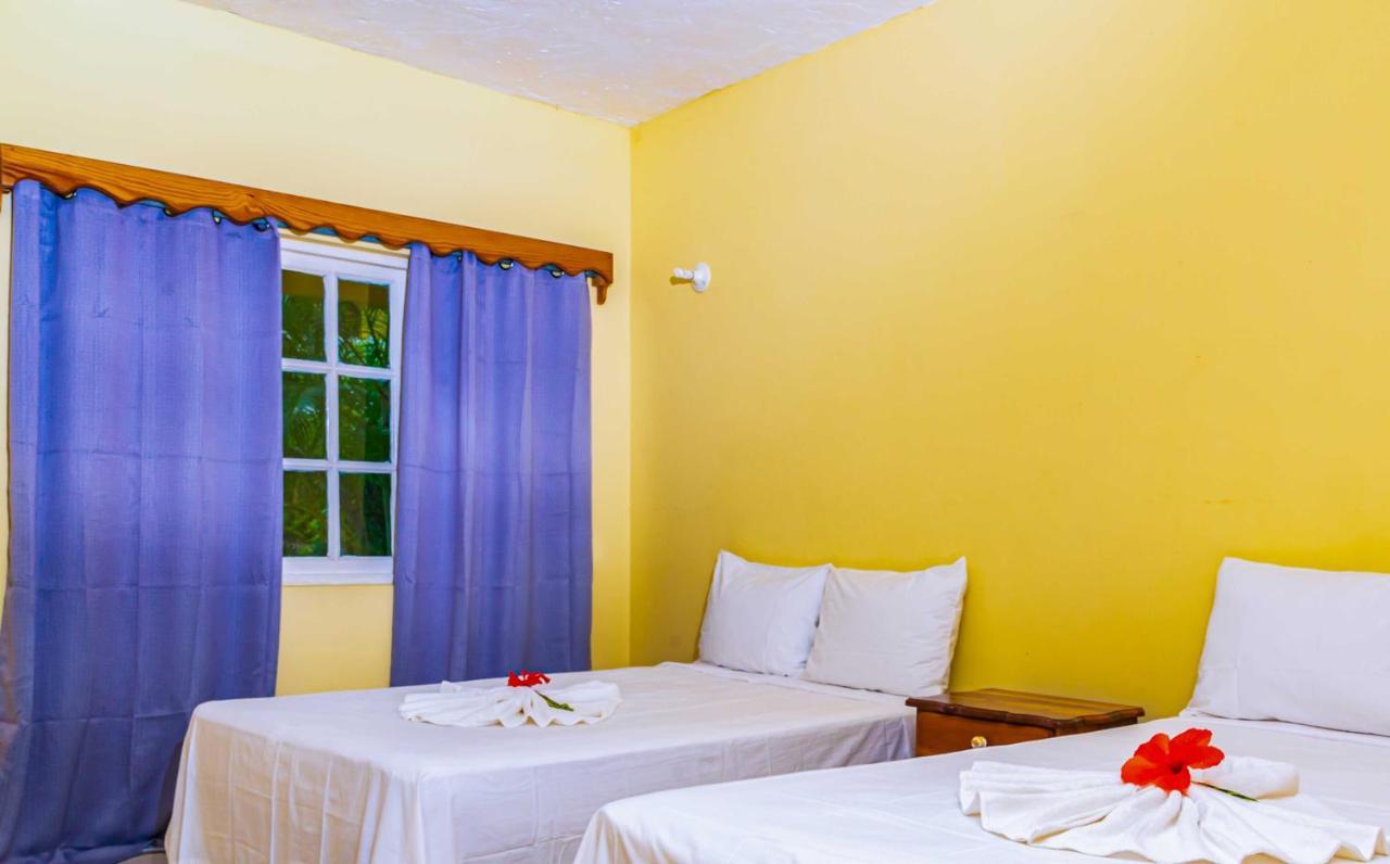 Yellow Bird Sea Negril Bagian luar foto